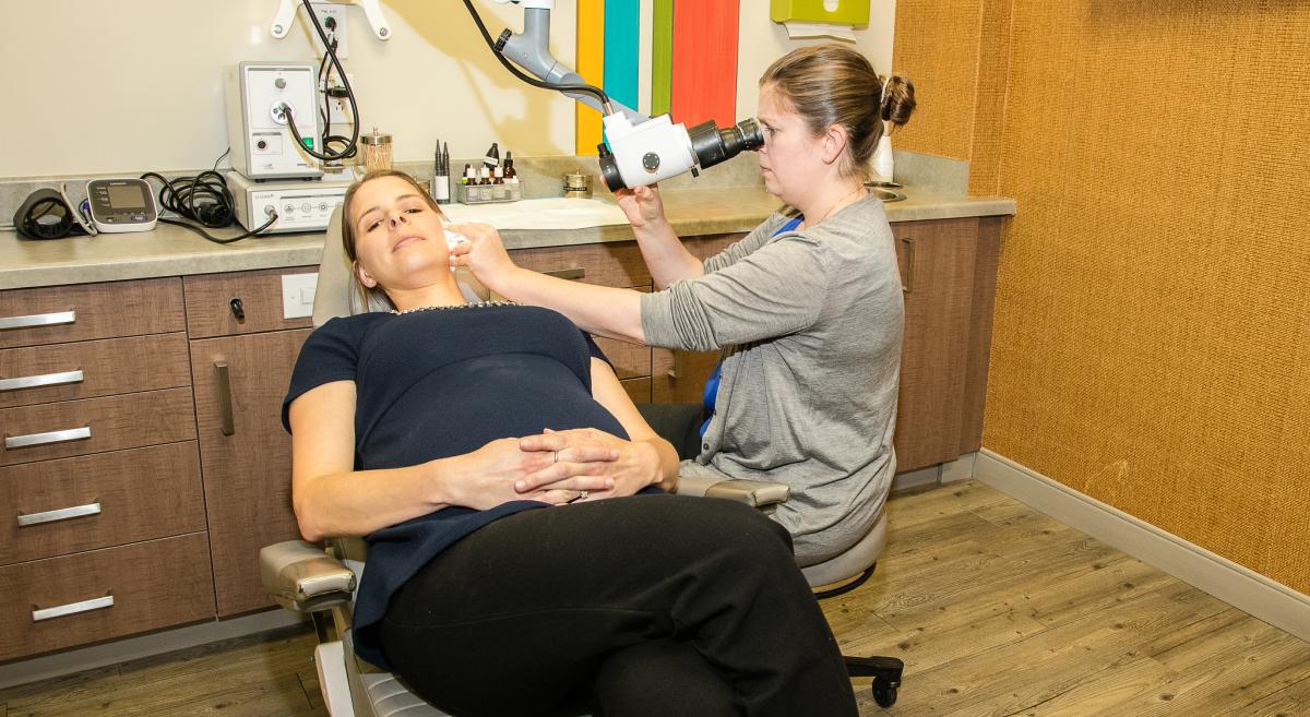 A patient having an ear examination